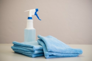 Cleaning supplies - spray bottle and microfiber